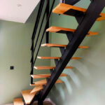 Escalier Bois et Métal fabriqué à Lille vue du de dessous