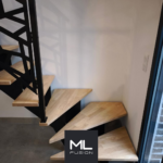 Escalier Stael quart tournant avec garde-corps en découpe laser